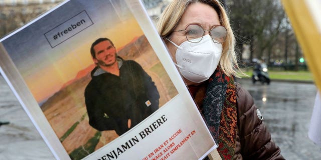 woman with poster