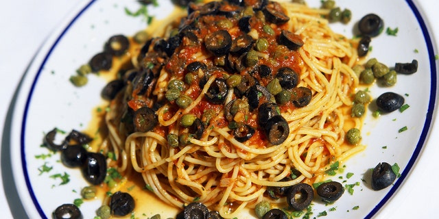 Pasta puttanesca on a plate