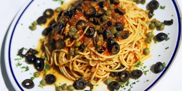 Pasta puttanesca on a plate