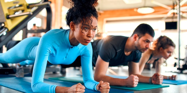 People exercising at gym