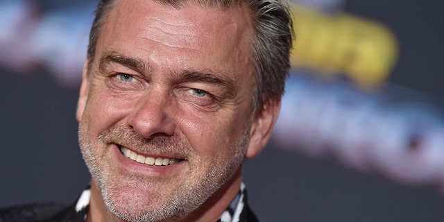 Ray Stevenson smiles in a close-up shot on the red carpet for "Thor: Ganarok" premiere