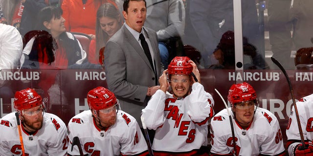 Rod Brind Amour on a bench