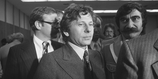 Roman Polanski wears a suit and tie in Santa Monica courthouse