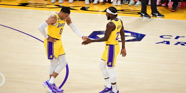Russ and Pat Bev high five