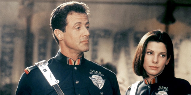 Sandra Bullock and Sylvester Stallone filming a scene for "Demolition Man"