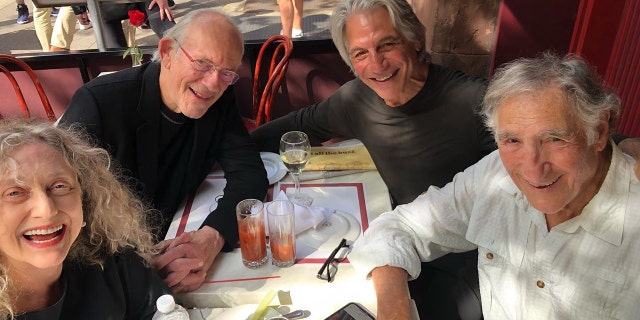 Carol Kane, Christopher Lloyd, Judd Hirsch and Tony Danza smiling at the camera