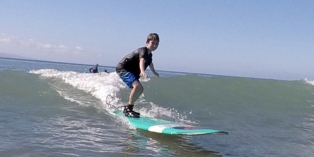 Nate Bronstein on a surfboard