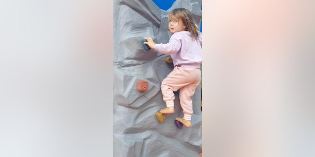 Toddler climbs