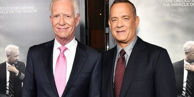 Tom Hanks and Sully at the premiere of "Sully" on Los Angeles