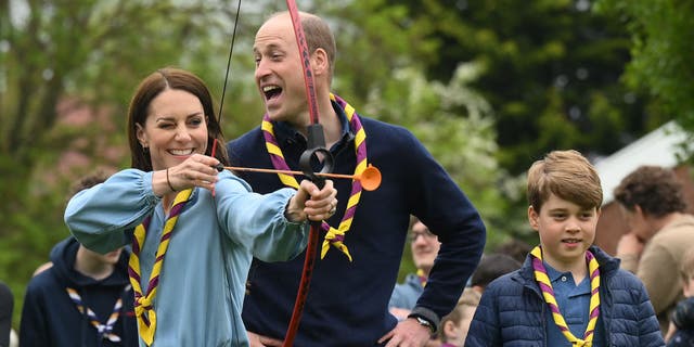 Kate Middleton smiles while practicing archery