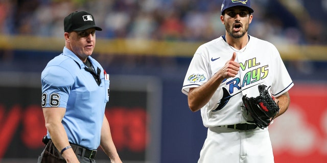 Zach Eflin with umpire