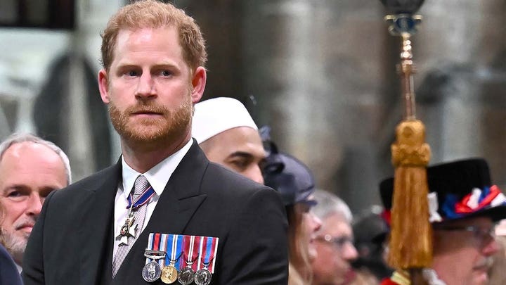 King Charles and Queen Consort Camilla make first balcony appearance