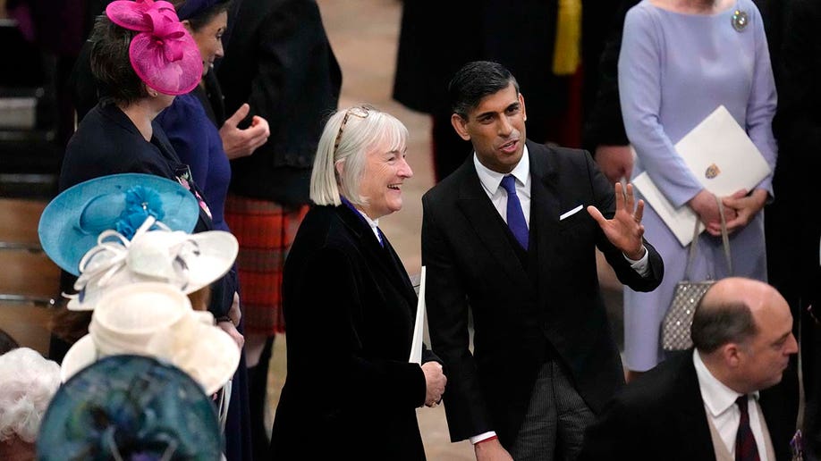 British Prime Minister Rishi Sunak has a chat following the Coronation of King Charles III and Queen Camilla at Westminster Abbey.