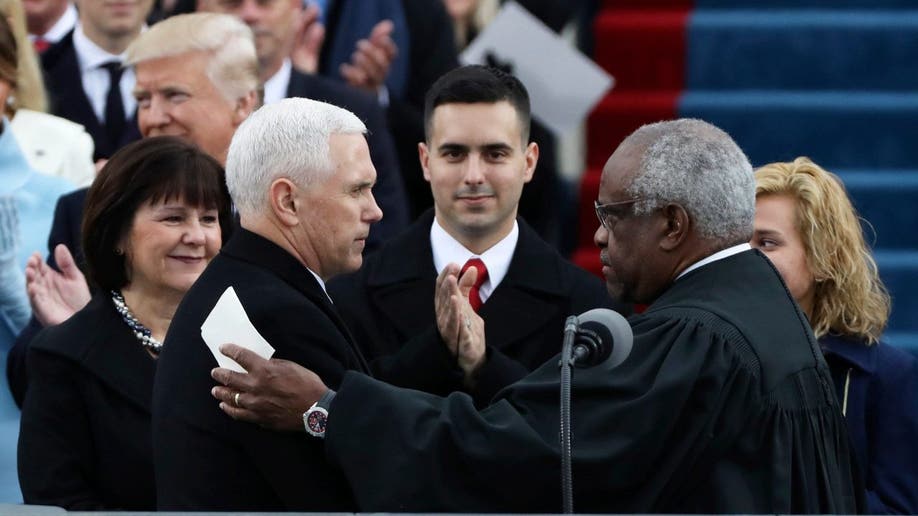 VP Mike Pence sworn in by Justice Clarence Thomas