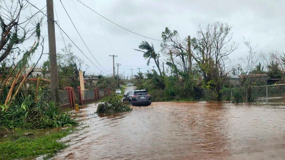 Typhoon Mawar Slams Guam, Knocking Out Power And Forcing Boil Water ...