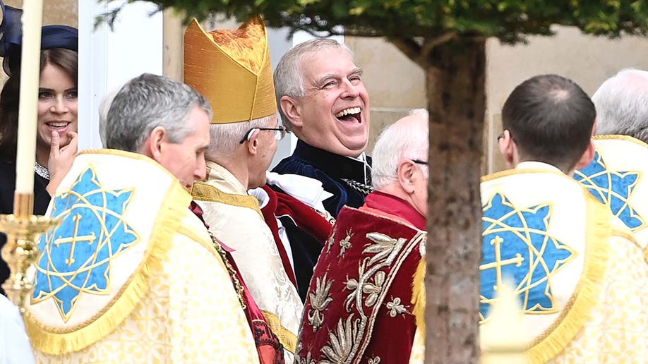 Prince Andrew, Duke of York laughs outside Westminster Abbey.