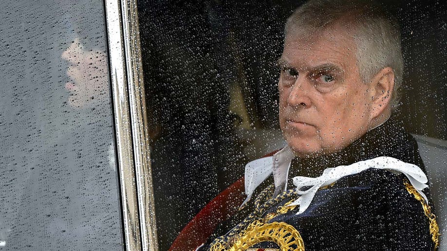 Prince Andrew, Duke of York leaves Westminster Abbey following the coronation ceremony.