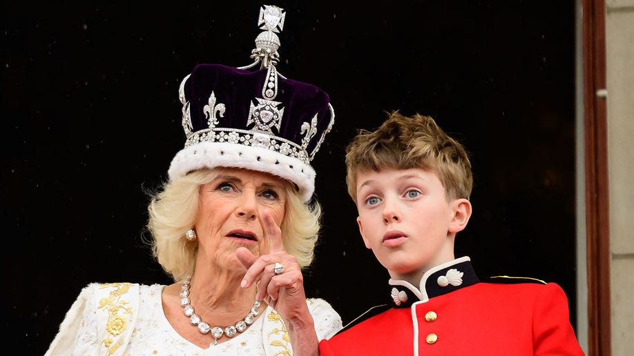 Queen Camilla talks to her grandson Freddy Parker Bowles 