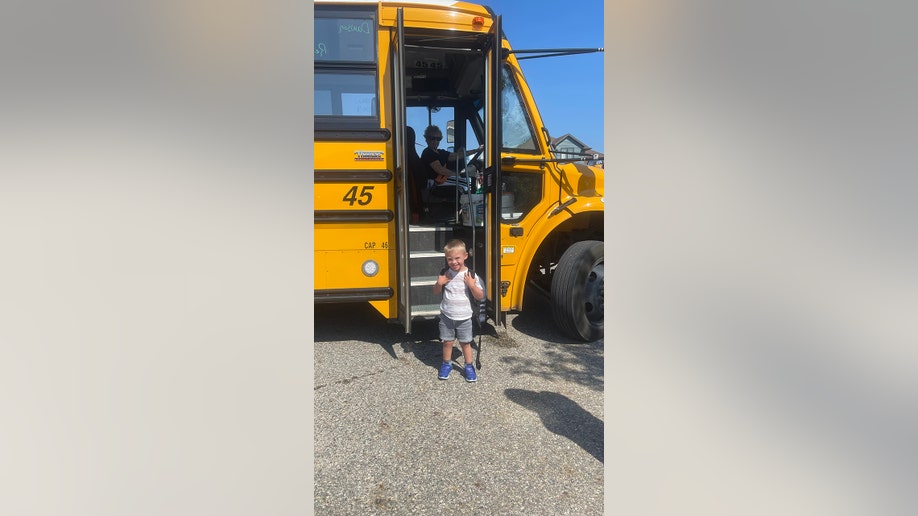 little boy with bus