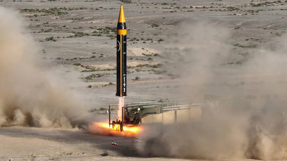 Iran unveils latest version of ballistic missile amid wider tensions over nuclear program