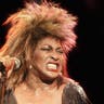 Tina Turner singing on stage in 1986