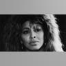Tina Turner looking at the camera pensively