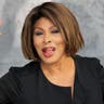 Tina Turner, who died in 2023, waving at the camera