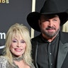 Dolly Parton and Garth Brooks on the 2023 ACM red carpet