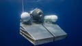 This file image provided by OceanGate shows the Titan submersible awaiting a signal on a platform.