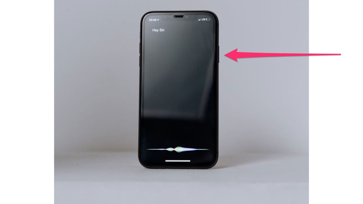 Photo of an iPhone standing upright.
