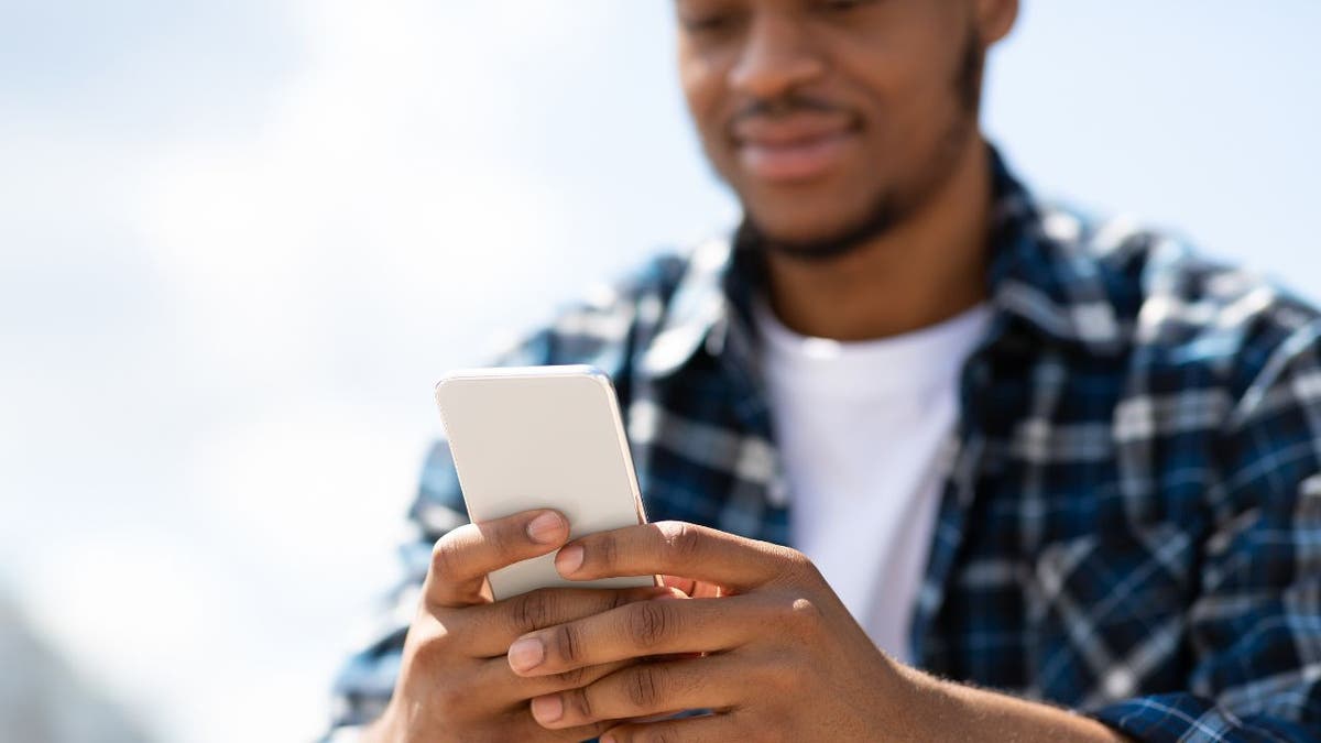 Man using his cell phone