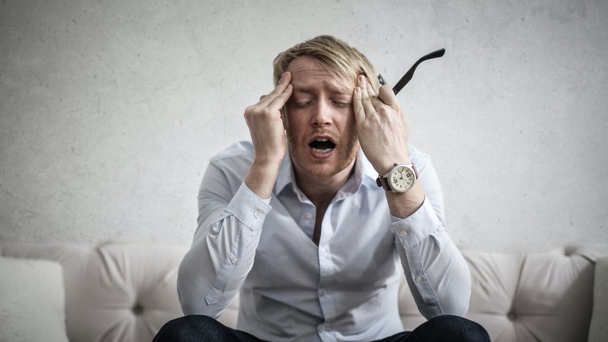 Picture of a man screaming stressed