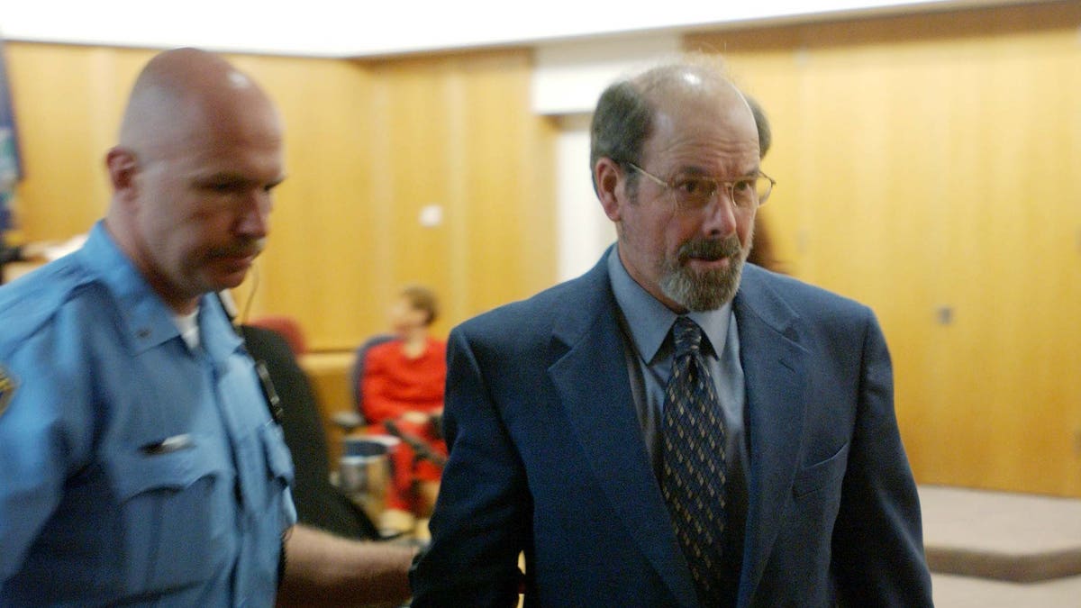 BTK murders suspect Dennis Rader is led out of his arraignment in Wichita Kansas.