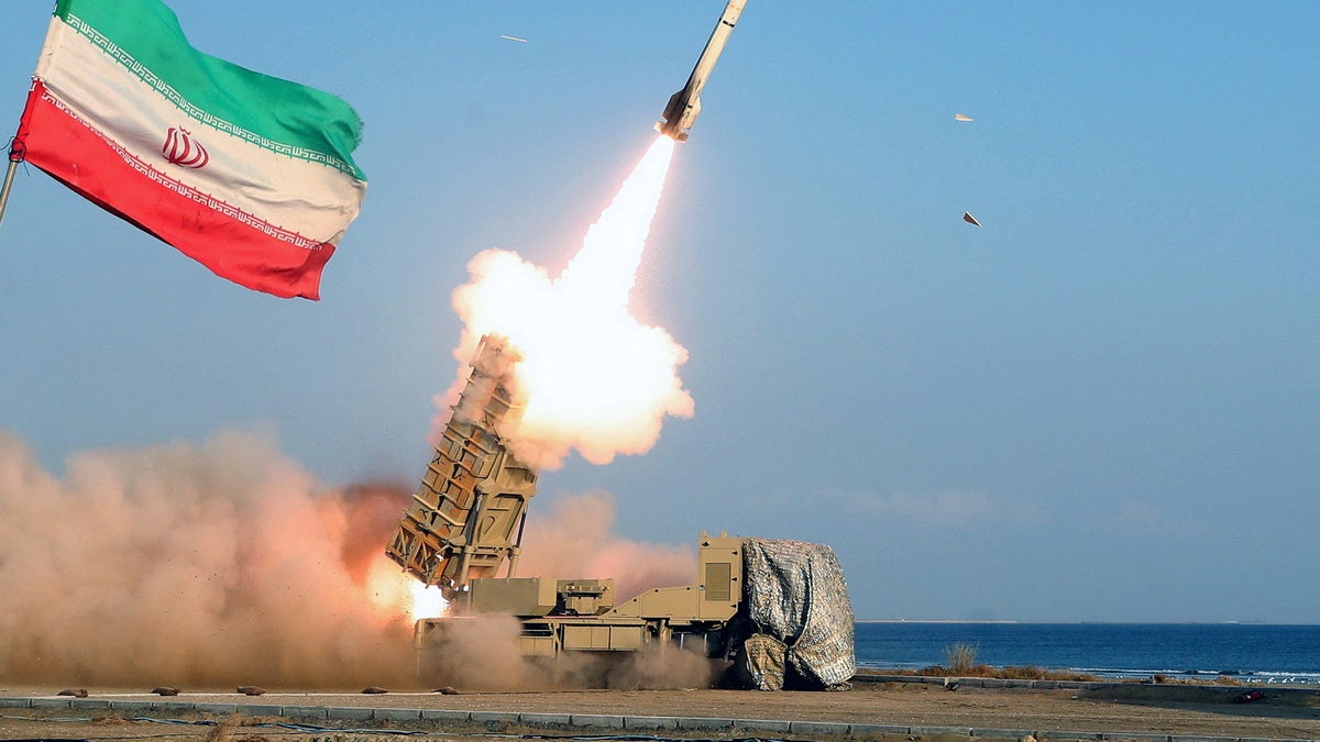 Iranian missle launch, Iran flag at left