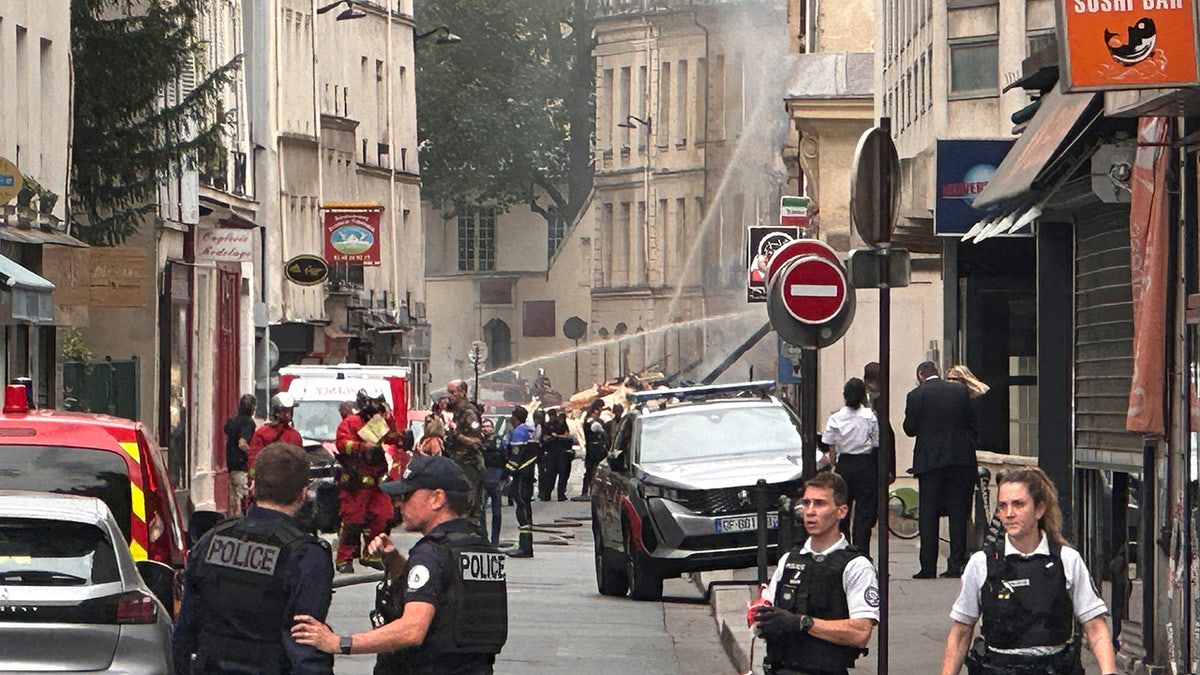 French police and firefighters respond to Paris explosion
