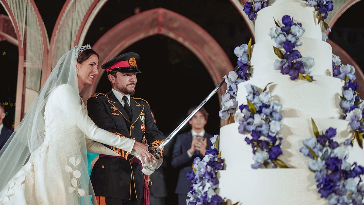 The prince and princess of Jordan cutting their cake
