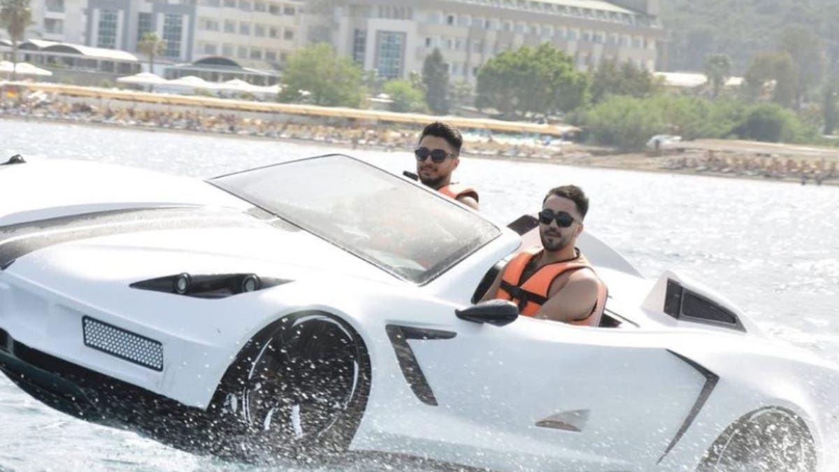 Men driving the jet ski.