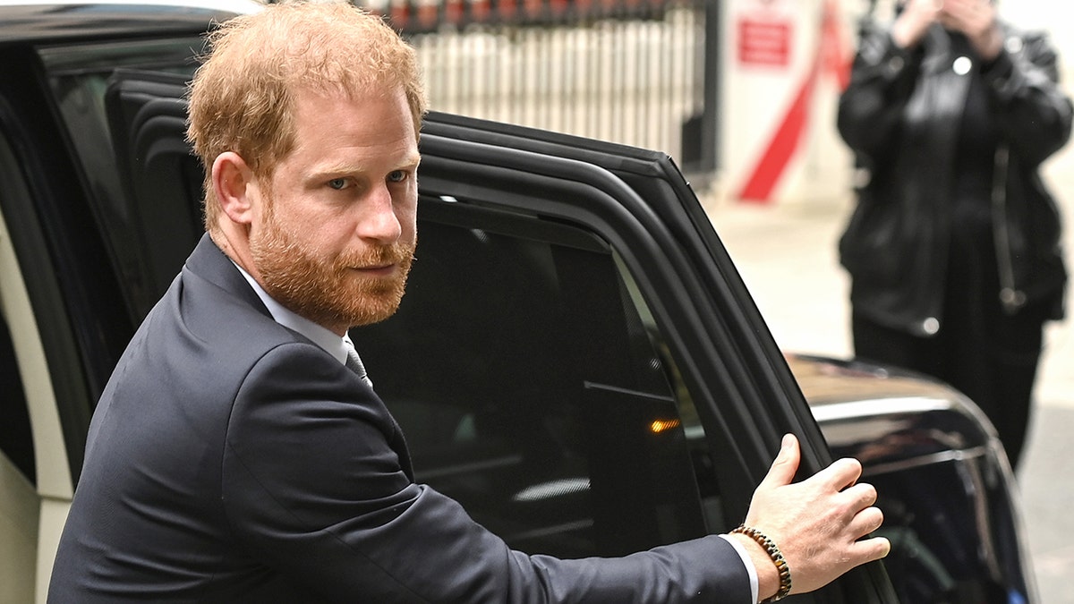 Prince Harry stepping out of a car