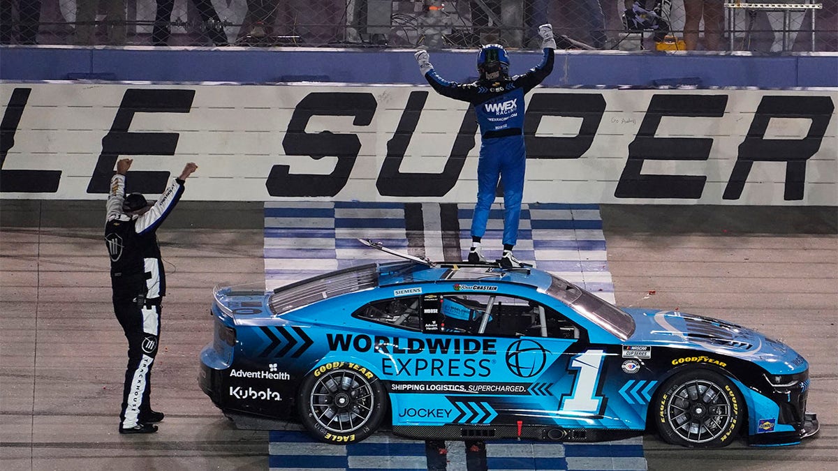 Ross Chastain celebrates atop his car