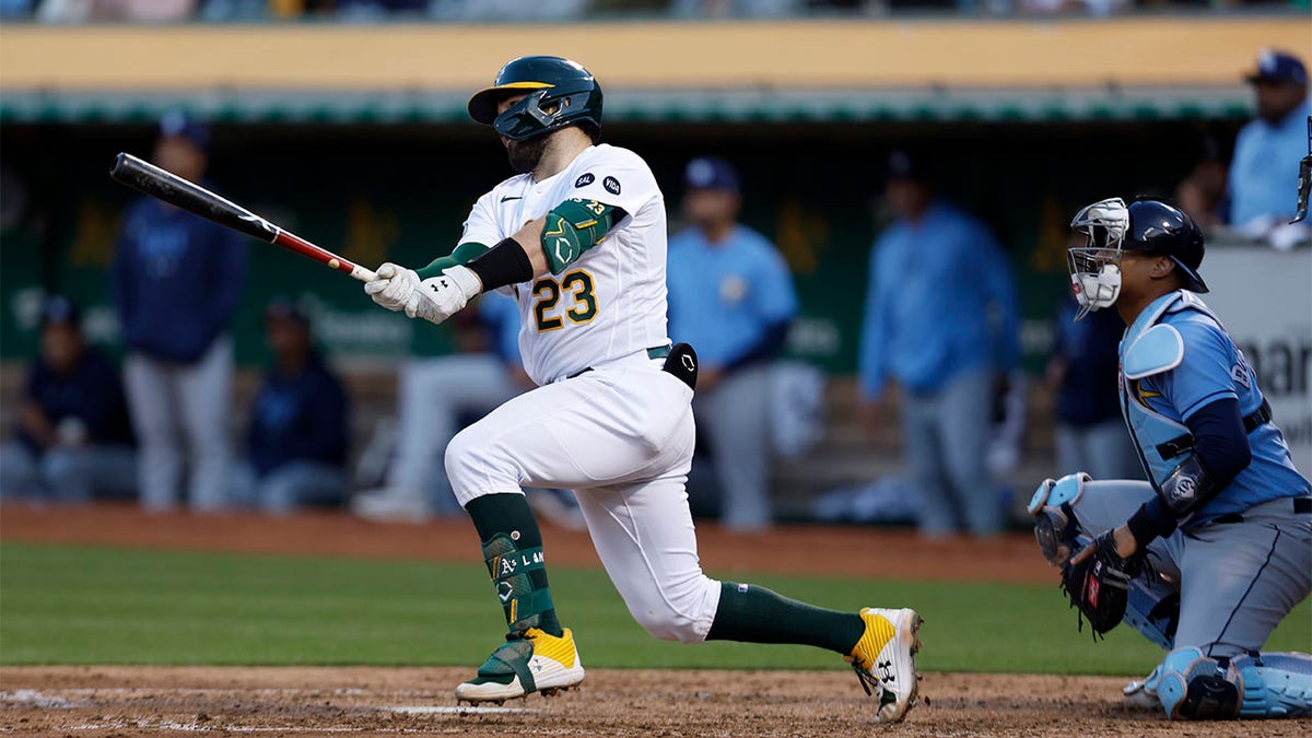 Aviators catcher Shea Langeliers (33) hustles down the line during a minor  league baseball game …