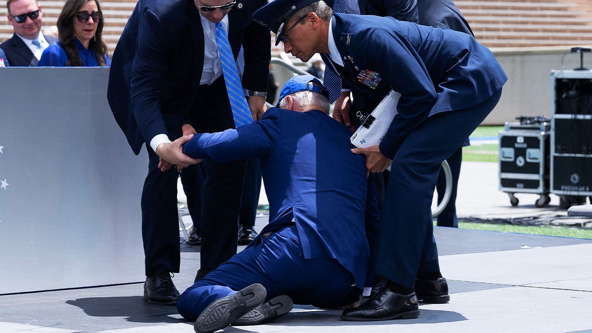 Biden falls at Air Force Academy