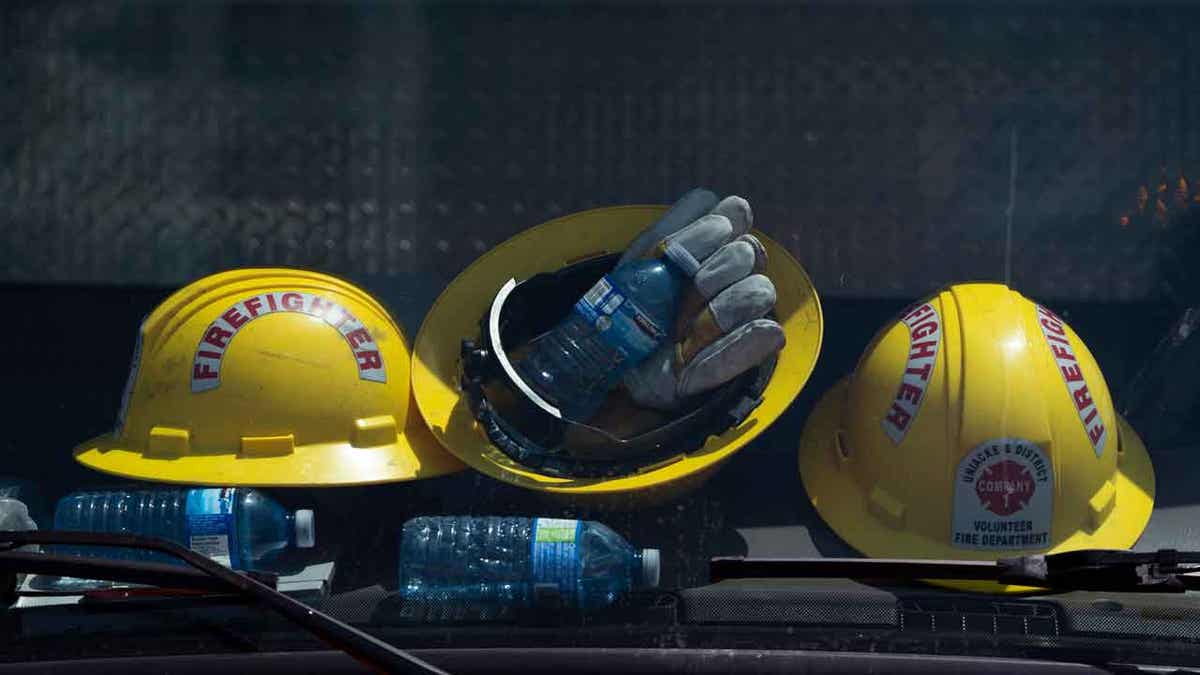 Firefighters helmets and water bottles