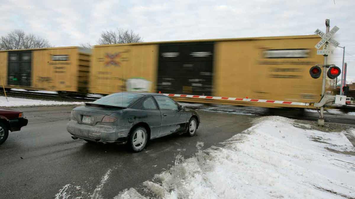 Car stopping for train