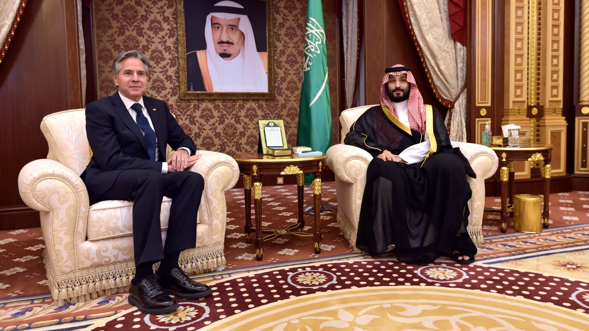 Saudi Arabia's Crown Prince Mohammed bin Salman sits with U.S. Secretary of State Antony Blinken