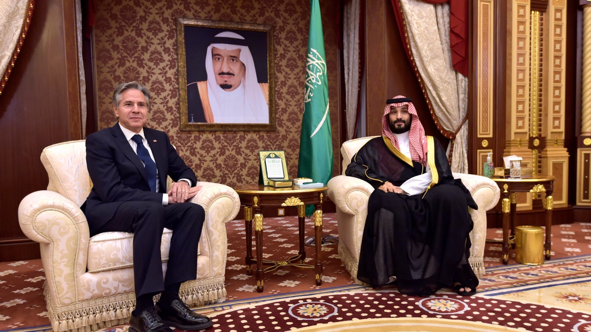 Saudi Arabia's Crown Prince Mohammed bin Salman sits with U.S. Secretary of State Antony Blinken