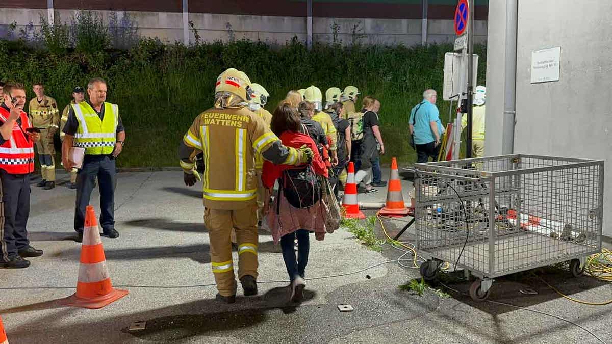 Firefighters help passengers