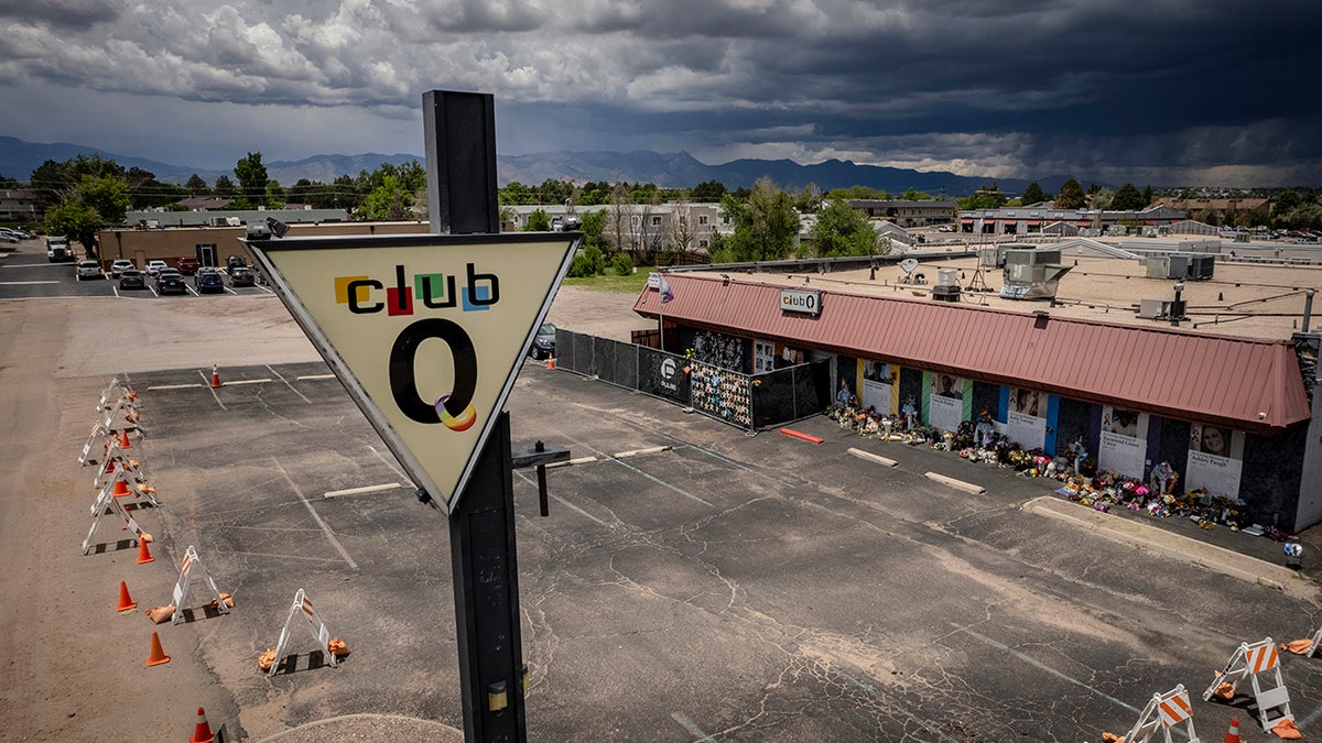 Parking lot of Club Q adorned with flowers