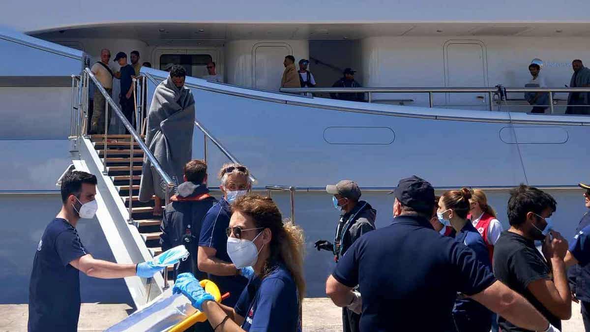 Survivors arrive by yacht 