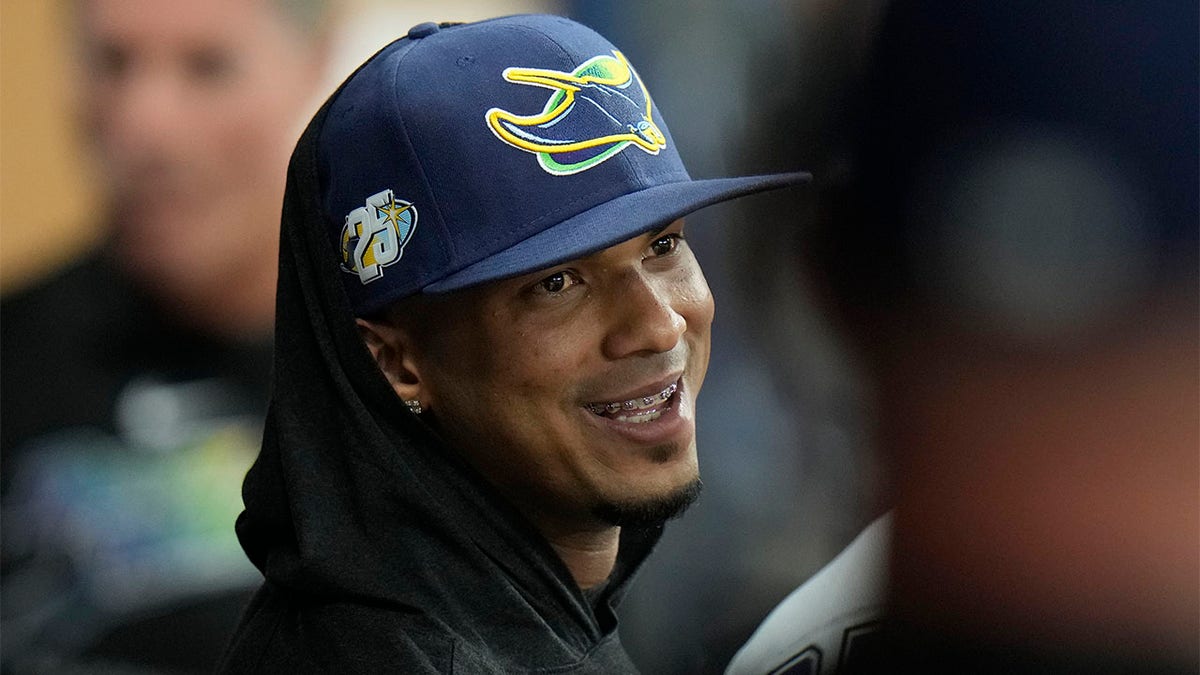 Wander Franco smiles while on the bench
