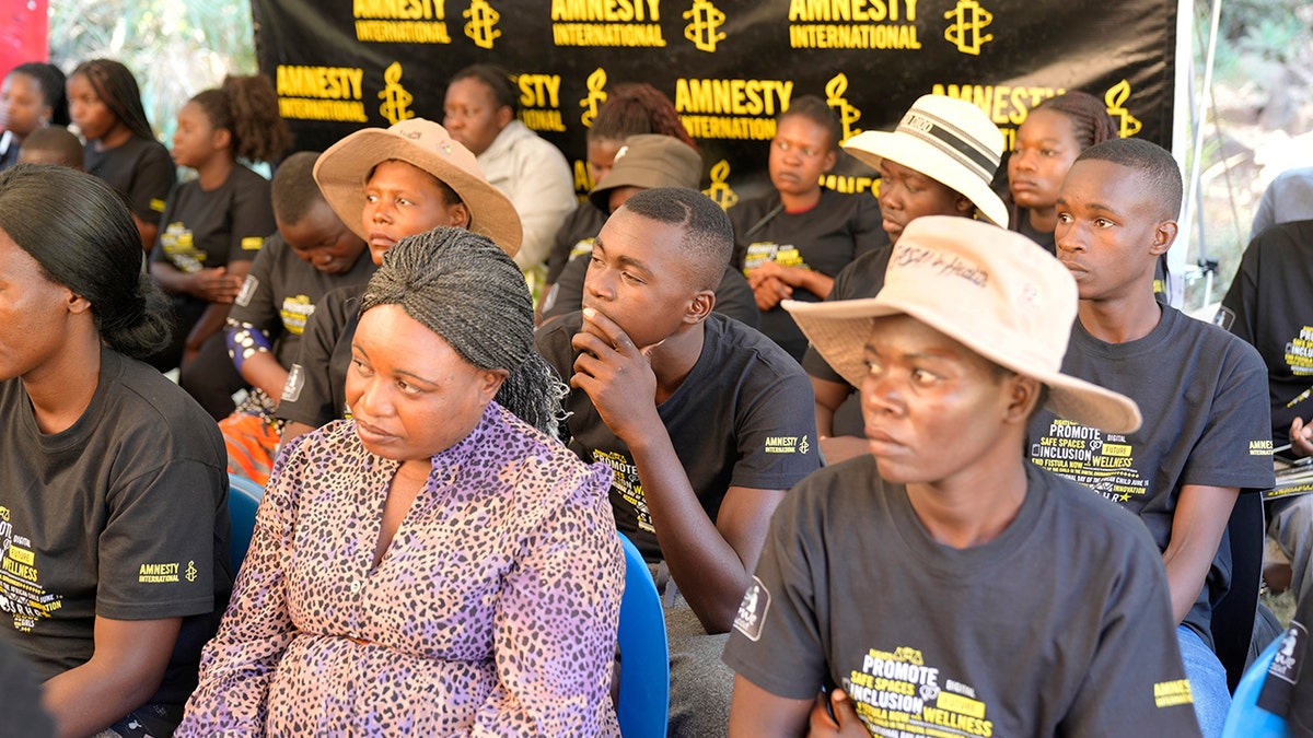 Women and men attend a workshop on sexual health